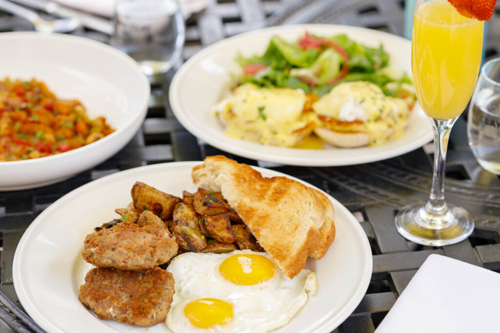 Brunch menu item - Conductors plate with a mimosa drink